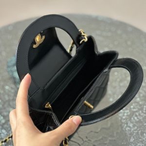 Bold & Beautiful: Chanel's Kelly Black Large Size Bag